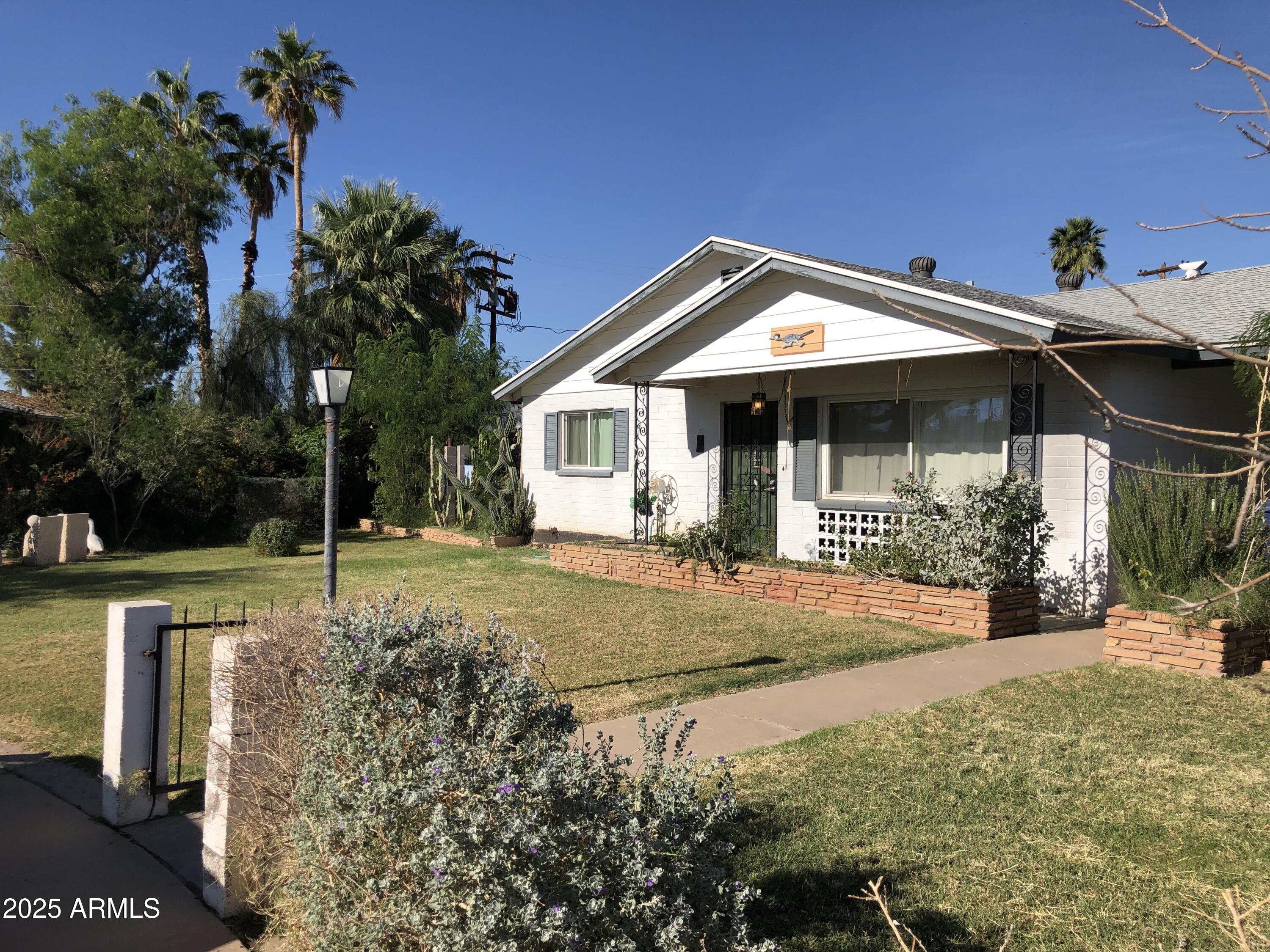 705 West 16th Street Tempe, AZ 85281 - Photo 1 of 24 a view of a house with basketball court