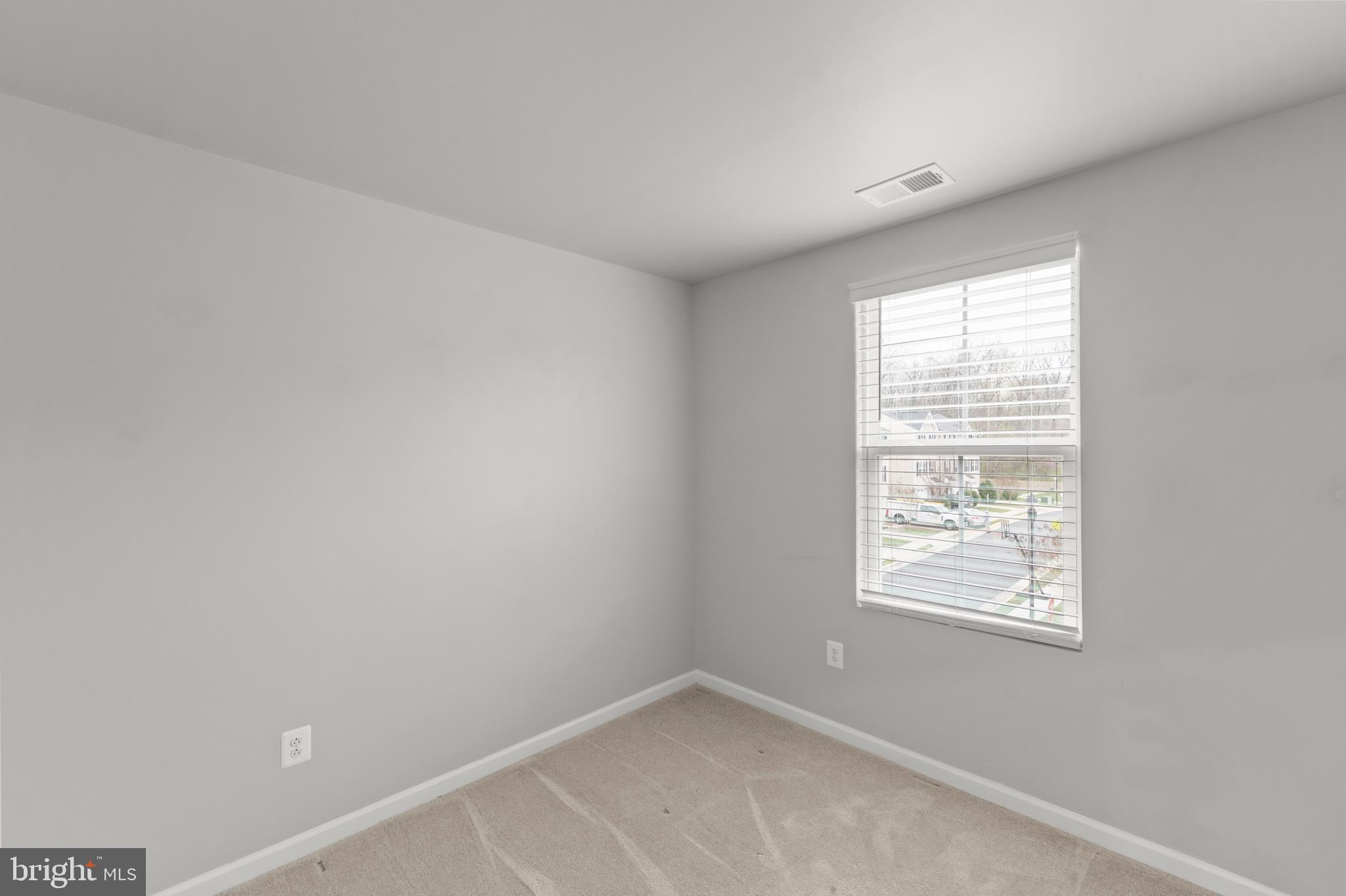 113 Reign Way Winchester, VA 22603 - Photo 17 of 35 an empty room with windows