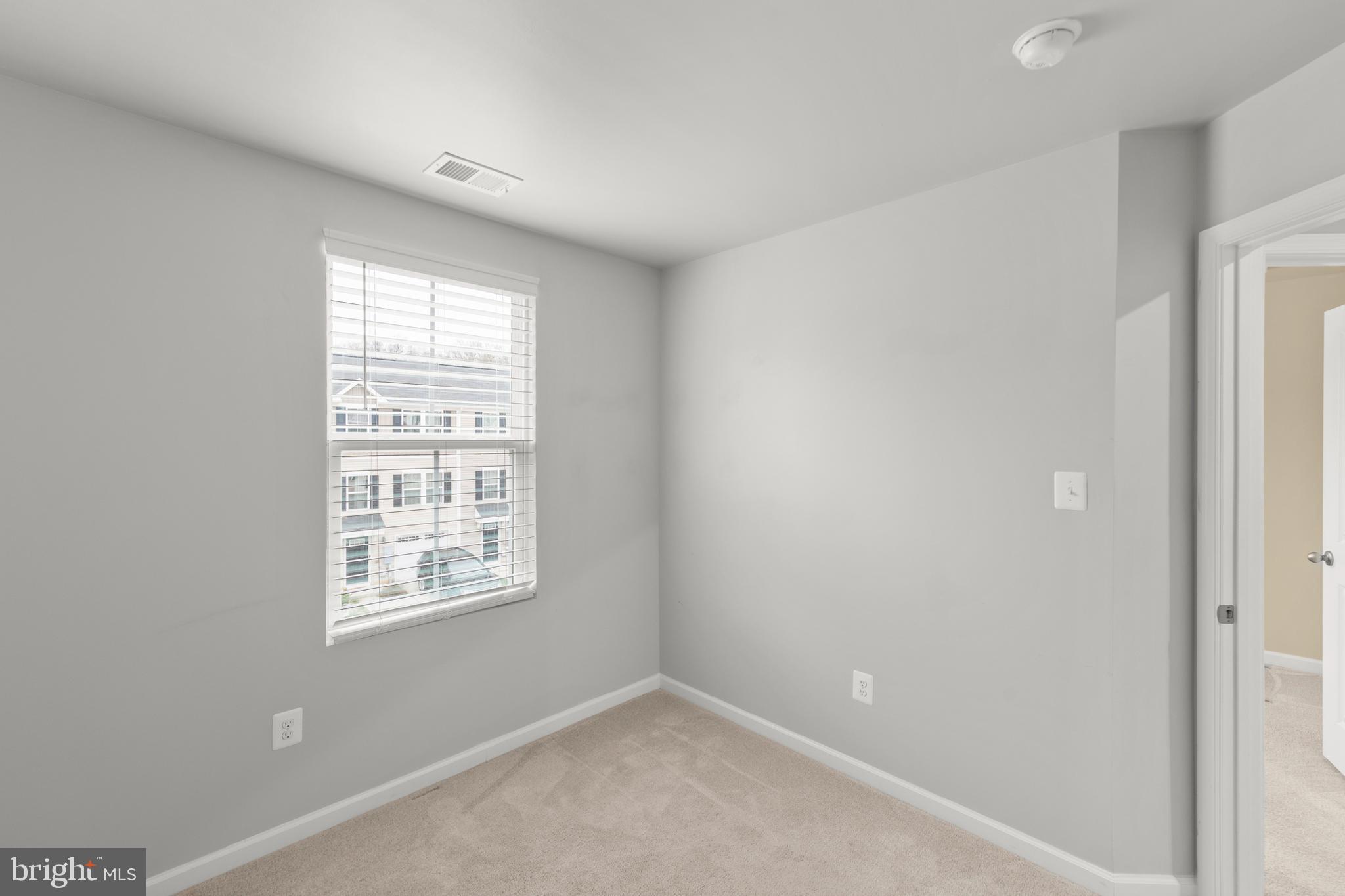 113 Reign Way Winchester, VA 22603 - Photo 18 of 35 an empty room with windows