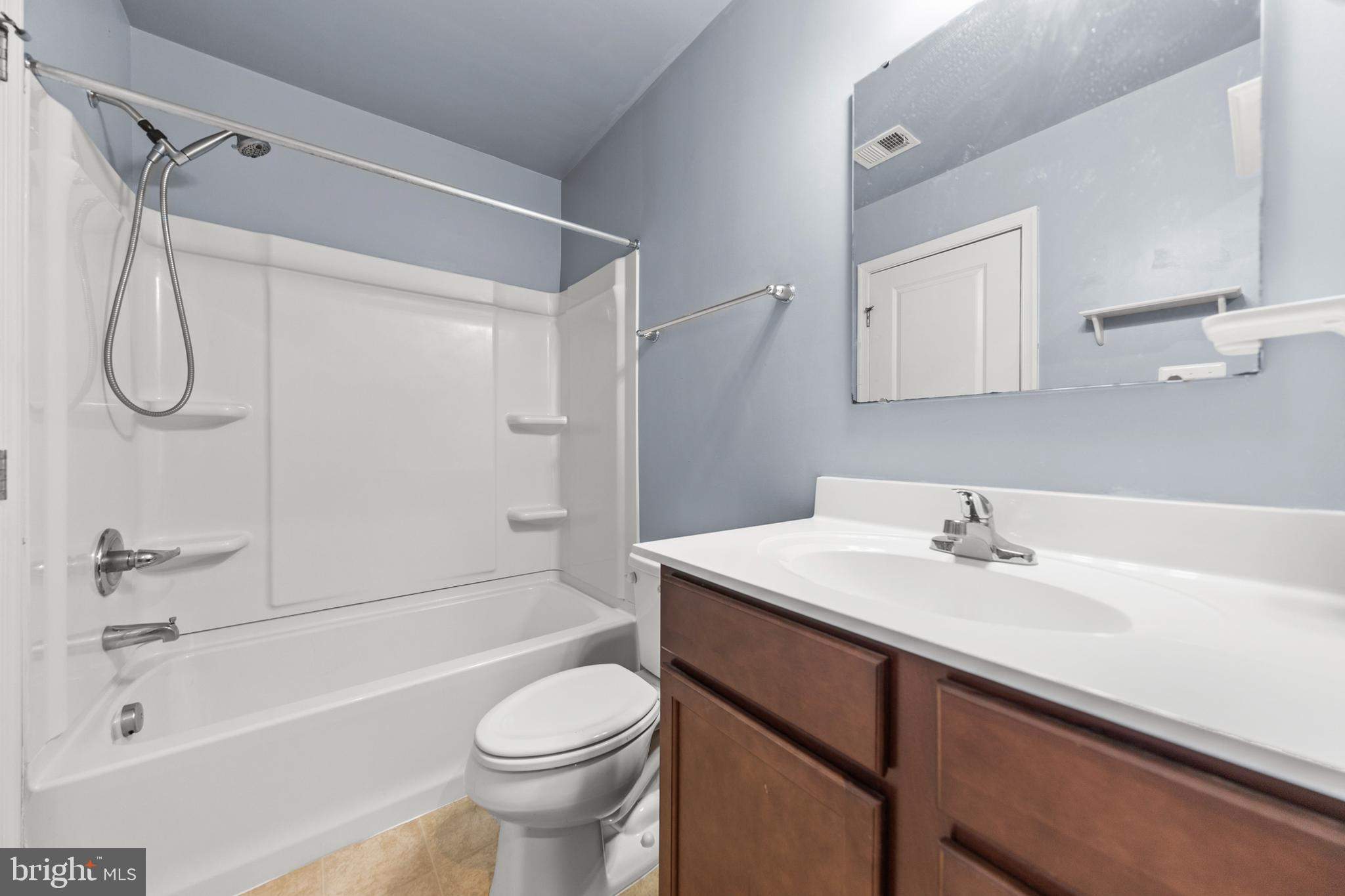 113 Reign Way Winchester, VA 22603 - Photo 20 of 35 a bathroom with a sink a toilet and a bathtub