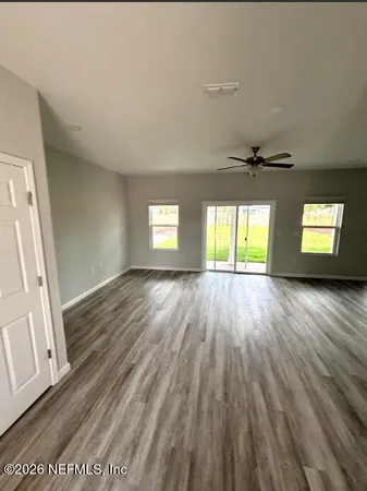 a view of dining room with furniture and window