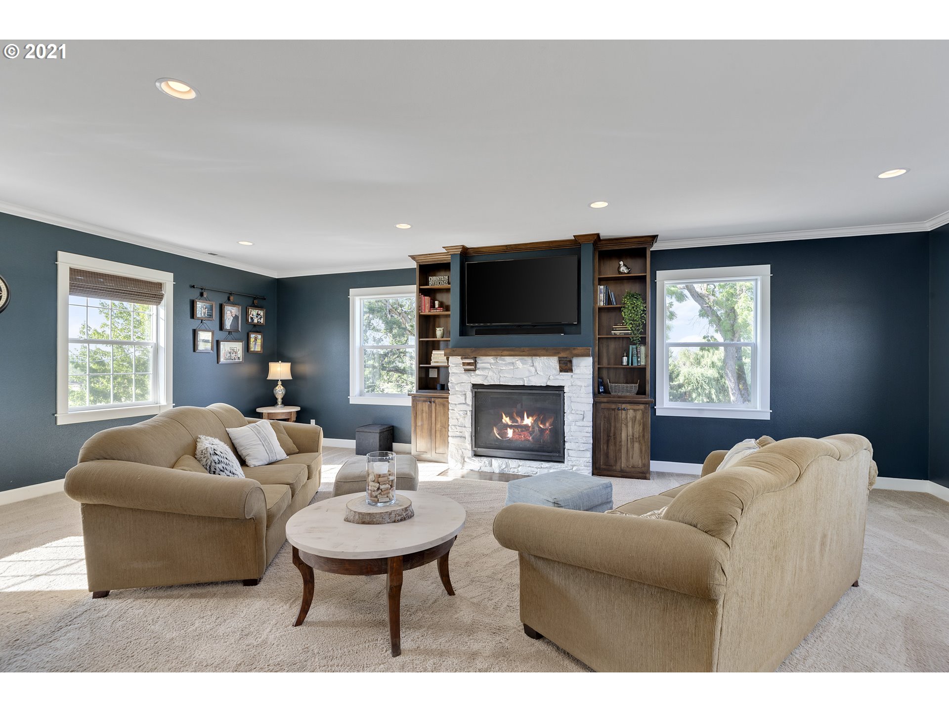 32991 South Kropf Road Molalla, OR 97038 - Photo 13 of 32 a living room with furniture a fireplace and a flat screen tv