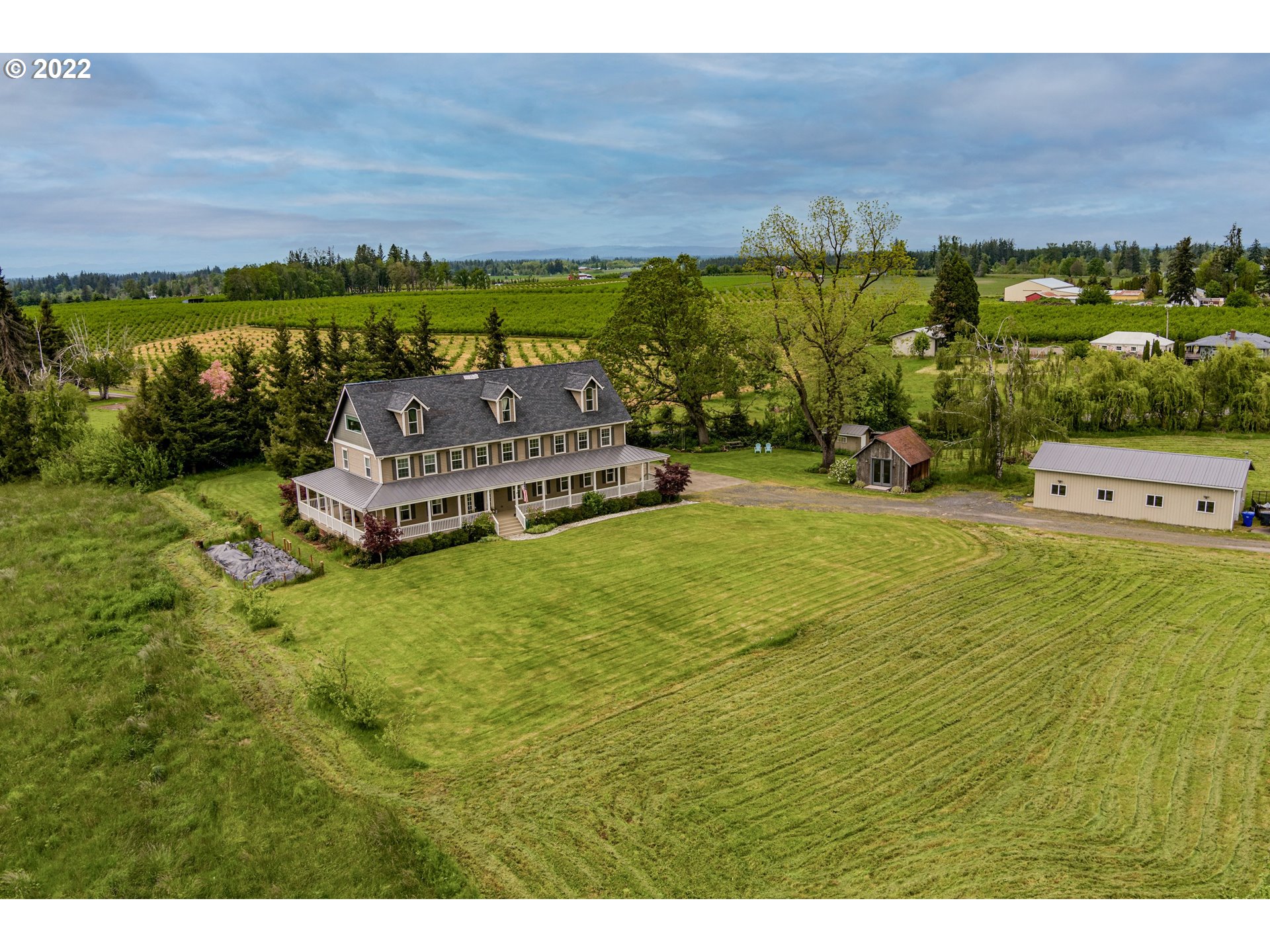 32991 South Kropf Road Molalla, OR 97038 - Photo 2 of 32 a view of a city with lawn chairs