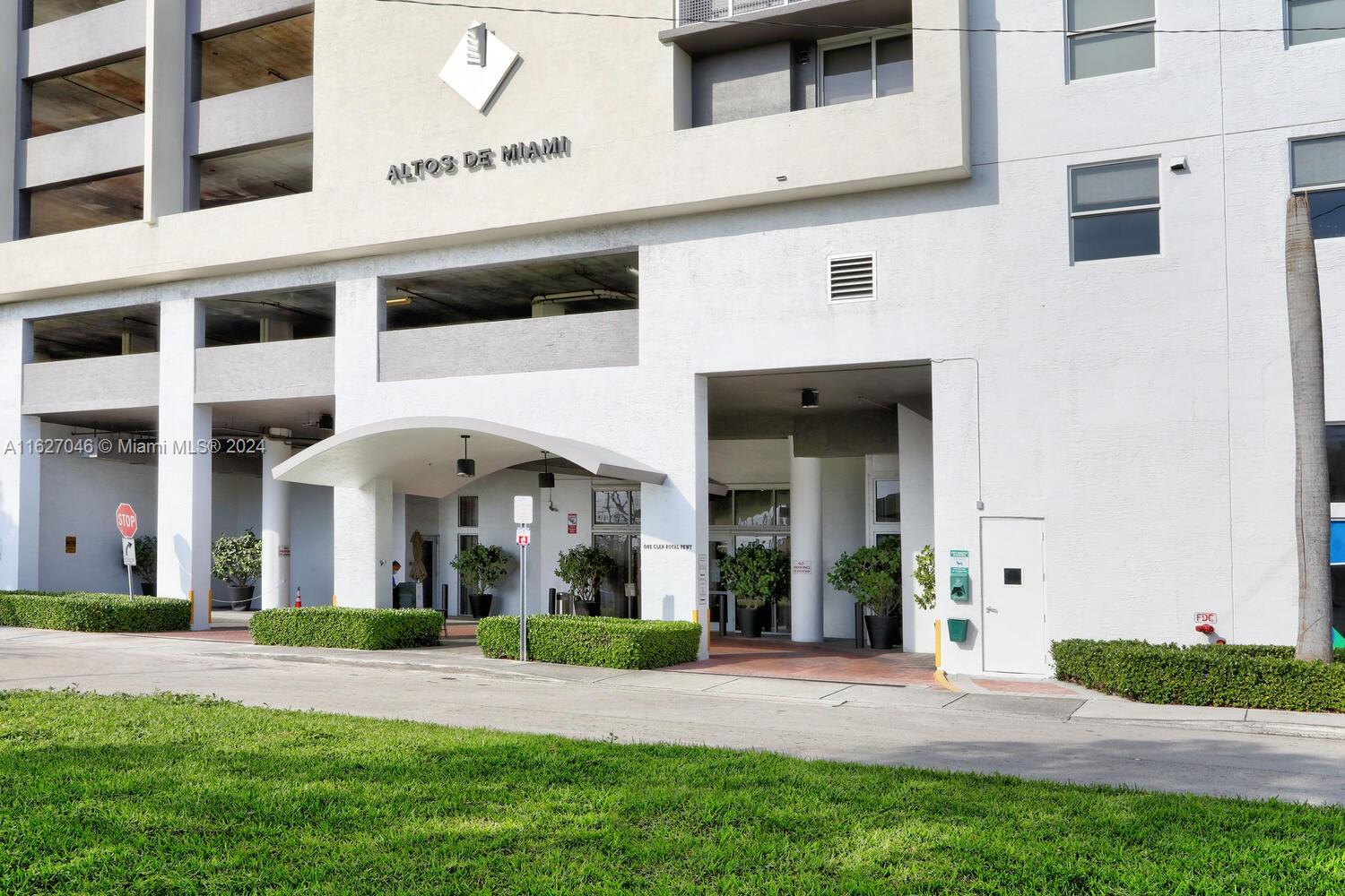West Flagler Miami, FL 33125 - Photo 24 of 29 a front view of a building with a garden
