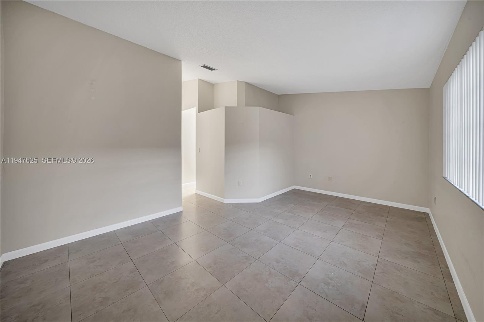14325 Southwest 57th Lane, Unit 66 Miami, FL 33183 - Photo 12 of 22 a view of an empty room