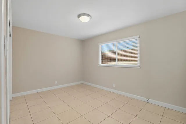 a view of a room that has a window in it