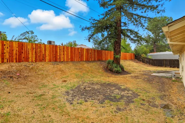 a bathroom with a sink and a yard