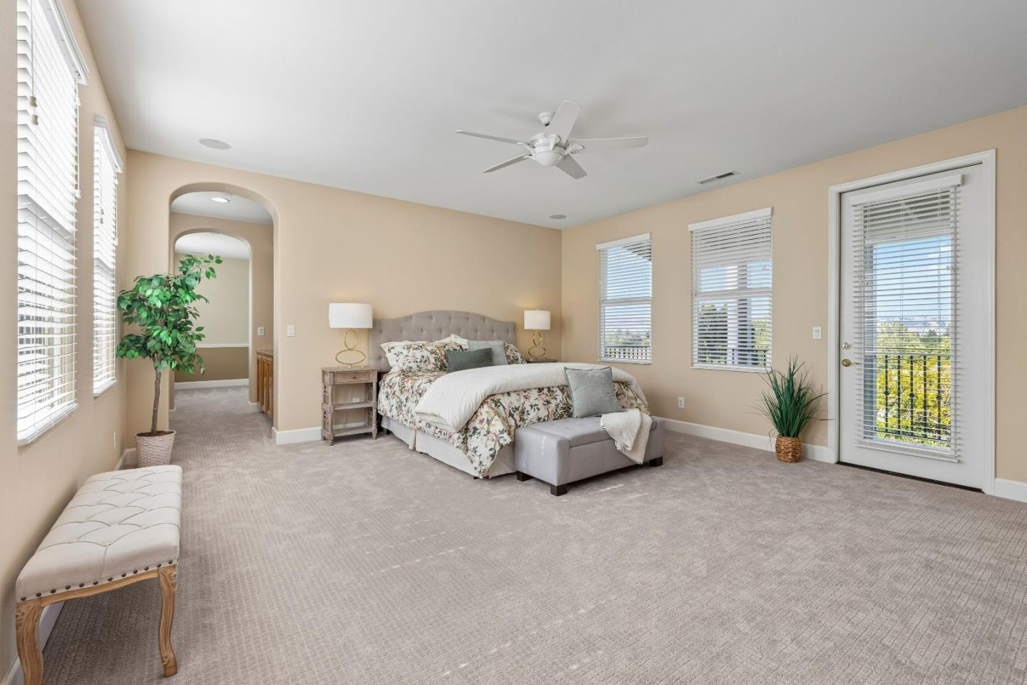 7466 Dunbar Court Gilroy, CA 95020 - Photo 47 of 103 a spacious bedroom with a bed and ceiling fan