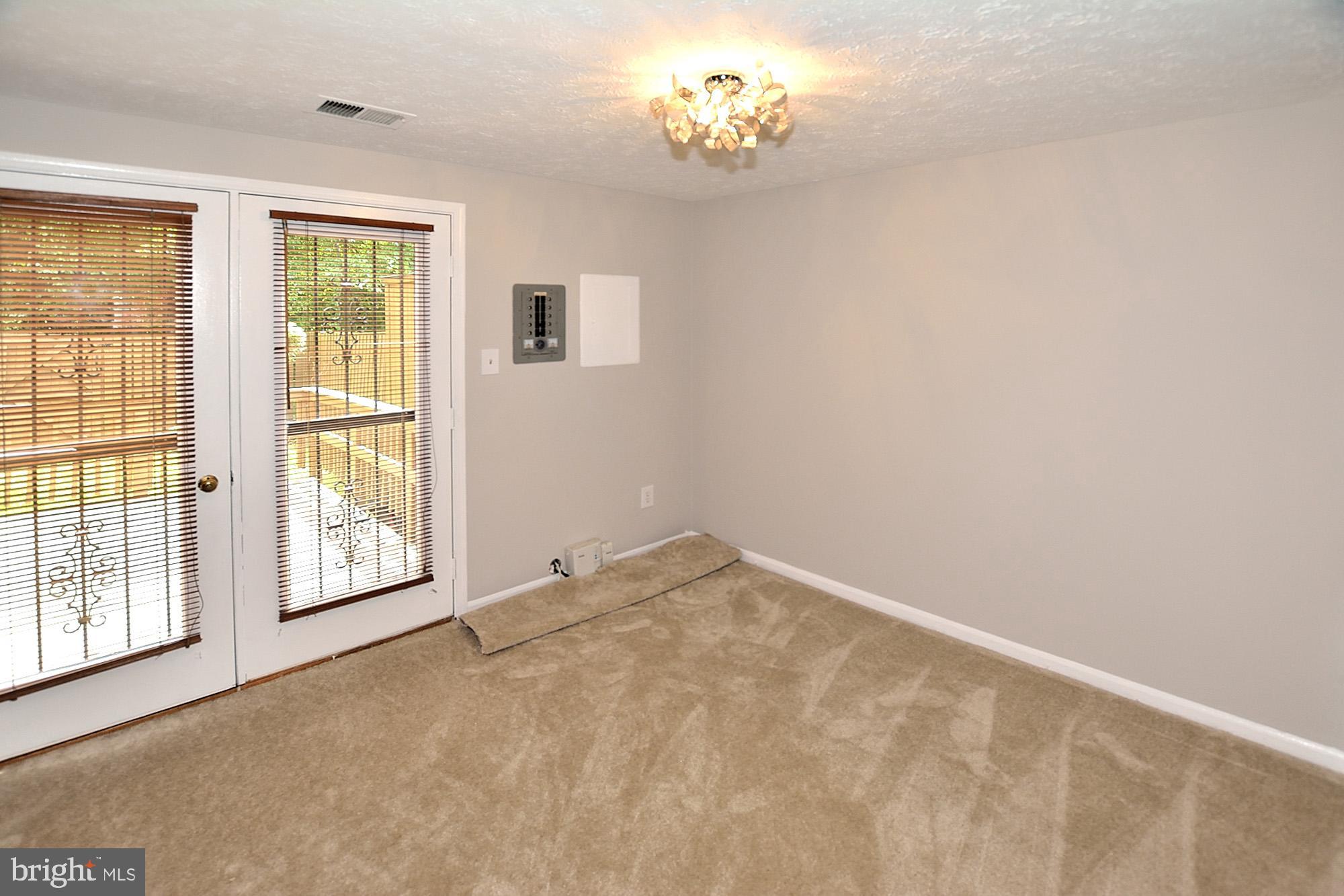 7475 Lone Star Road Lorton, VA 22079 - Photo 8 of 22 French doors to backyard