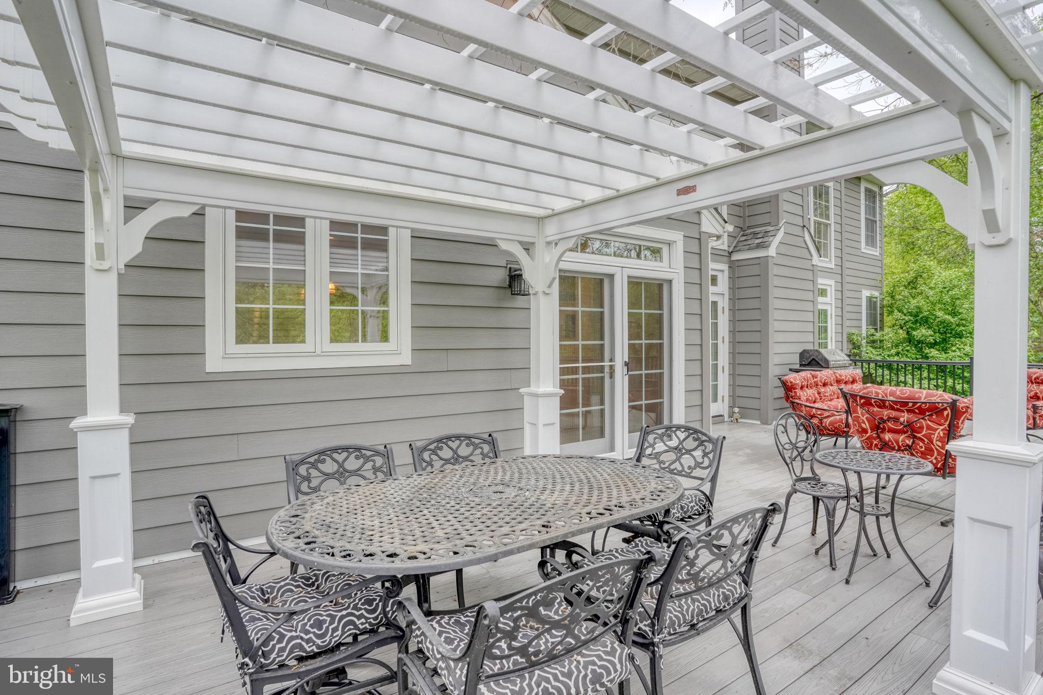 357 Willits Way Garnet Valley, PA 19060 - Photo 51 of 63 a patio with table and chairs and potted plants