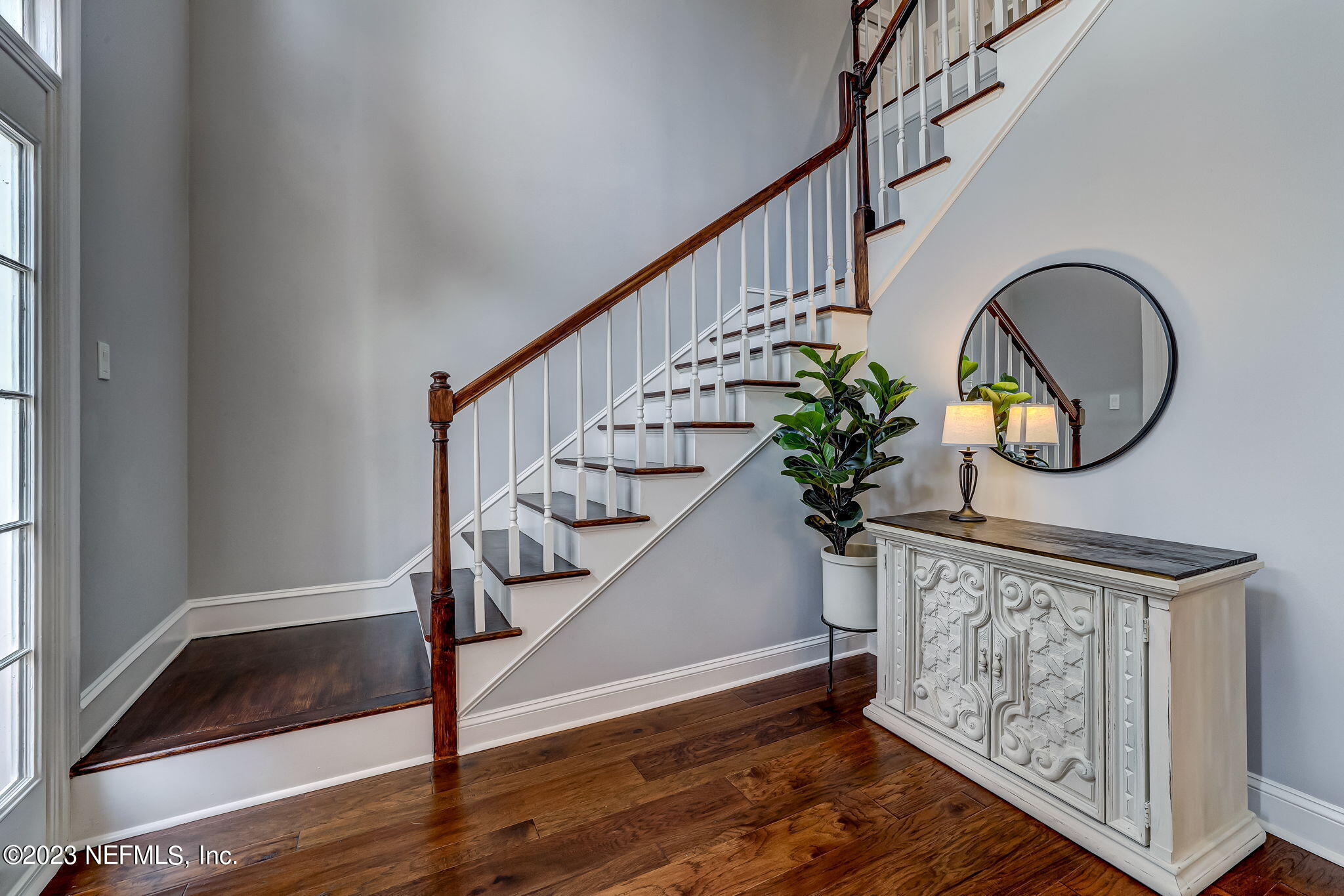 2011 Salt Myrtle Lane Fleming Island, FL 32003 - Photo 11 of 124 a view of entryway with wooden floor and a front door