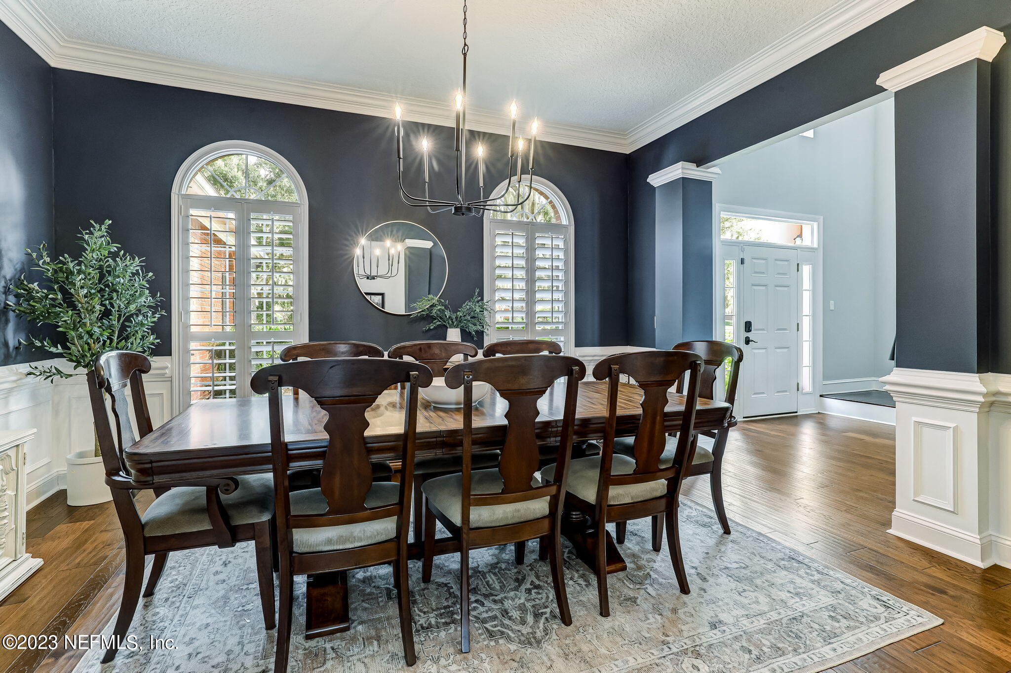 2011 Salt Myrtle Lane Fleming Island, FL 32003 - Photo 13 of 124 a view of a dining room with furniture window and wooden floor