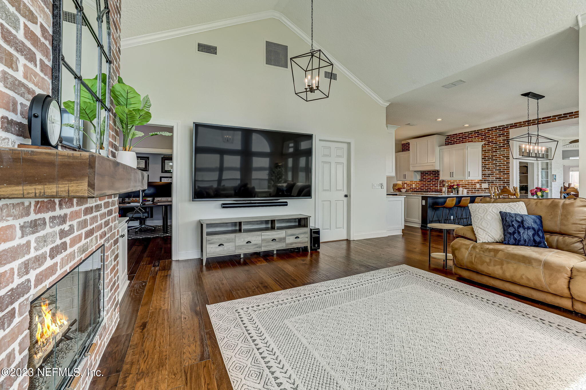 2011 Salt Myrtle Lane Fleming Island, FL 32003 - Photo 21 of 124 a living room with furniture and a flat screen tv