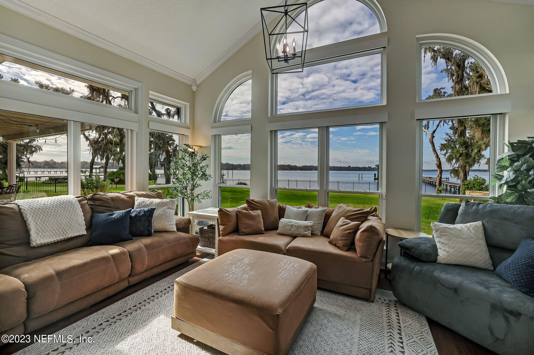 2011 Salt Myrtle Lane Fleming Island, FL 32003 - Photo 24 of 124 a living room with furniture and a large window