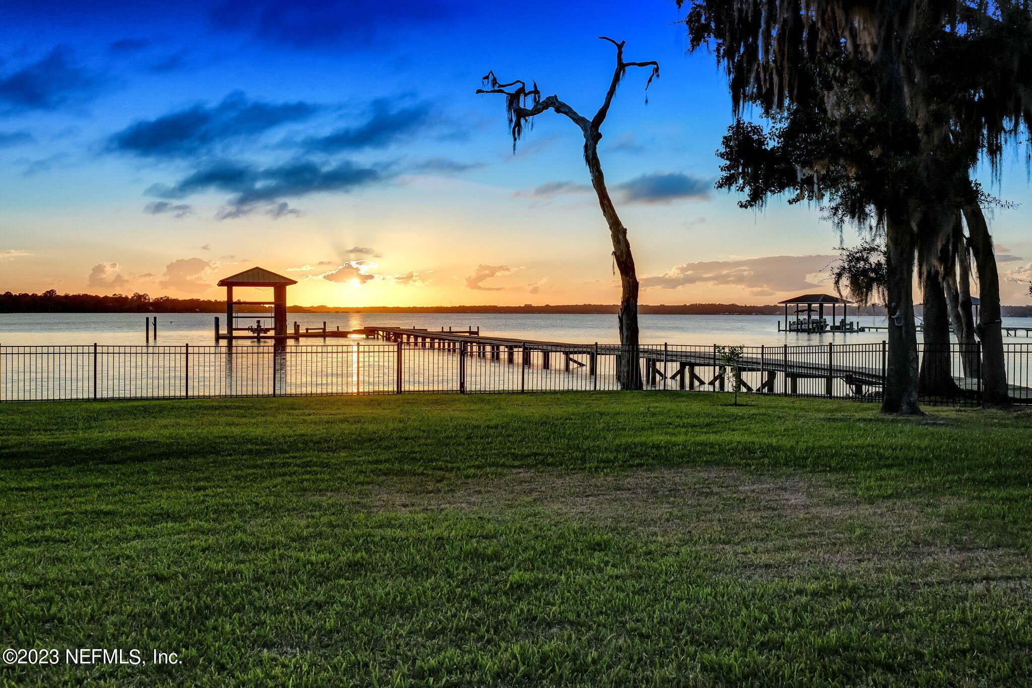 2011 Salt Myrtle Lane Fleming Island, FL 32003 - Photo 4 of 124 a view of a garden and lake