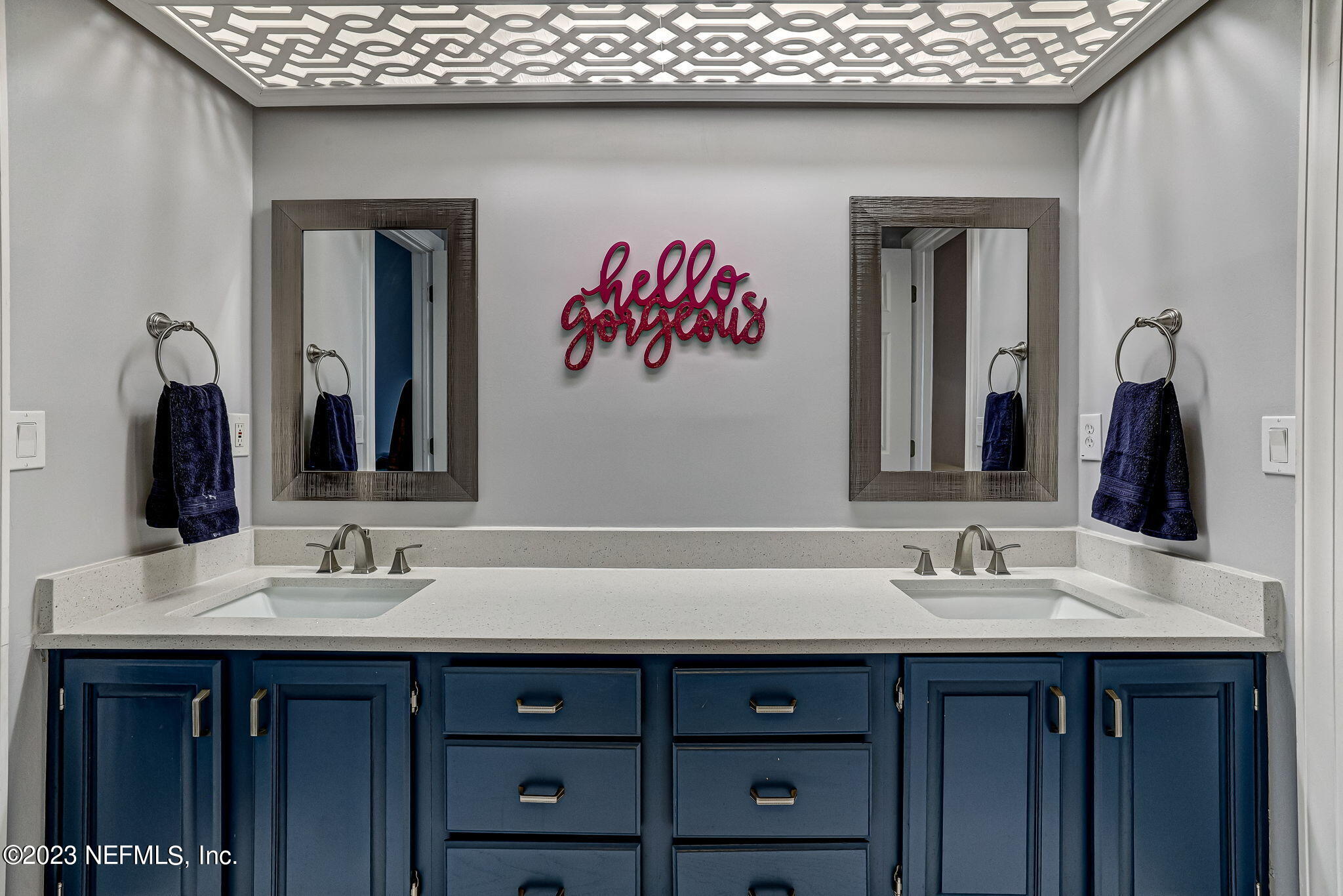 2011 Salt Myrtle Lane Fleming Island, FL 32003 - Photo 59 of 124 a bathroom with a sink and a mirror