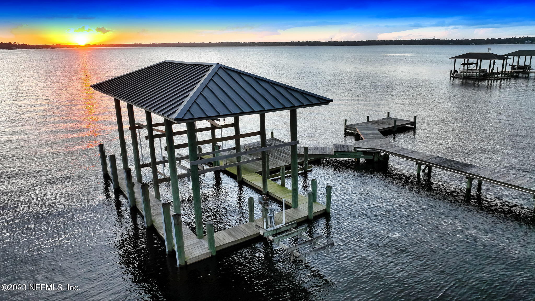 2011 Salt Myrtle Lane Fleming Island, FL 32003 - Photo 6 of 124 a terrace with outdoor seating and wooden floor