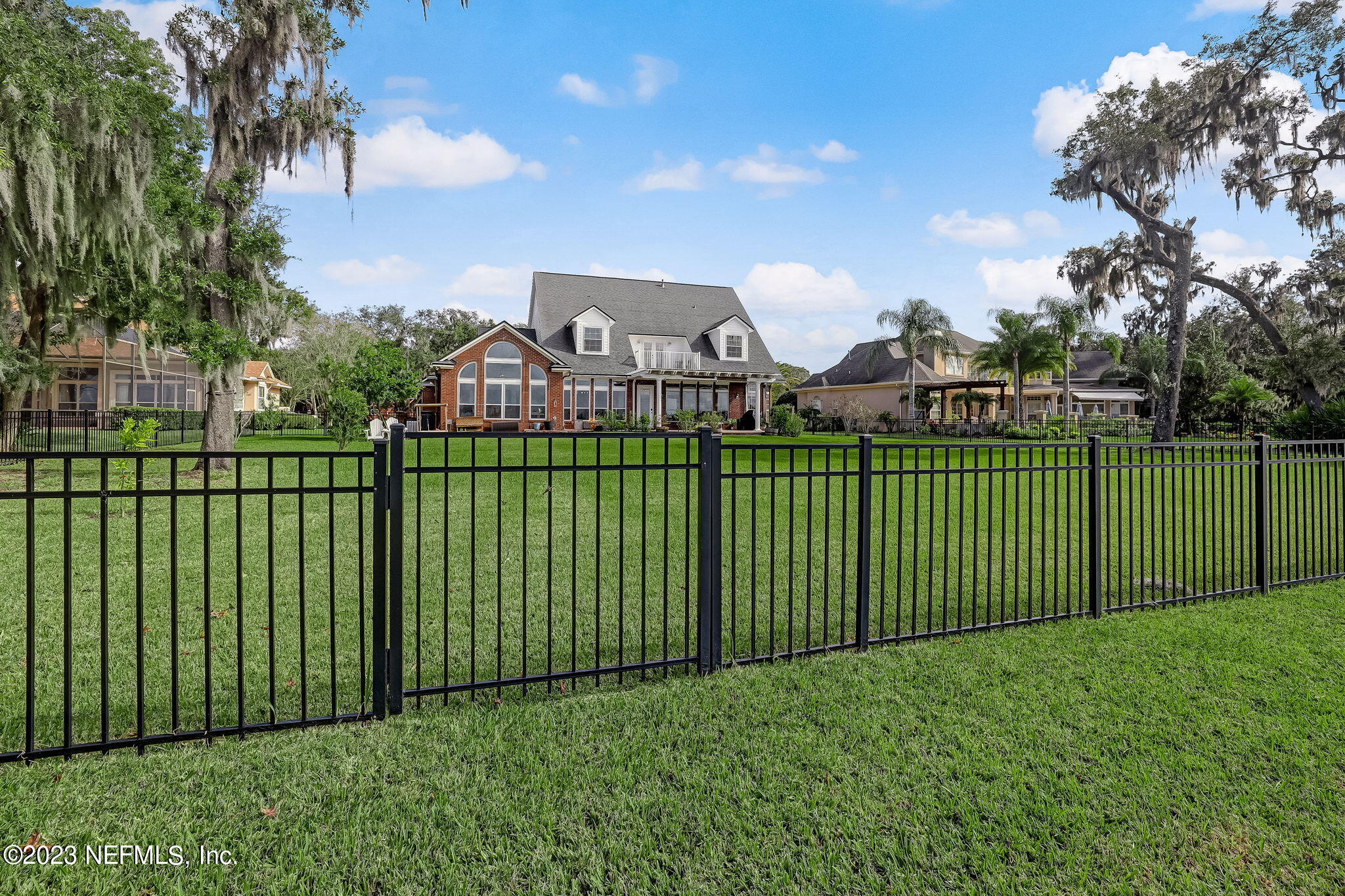 2011 Salt Myrtle Lane Fleming Island, FL 32003 - Photo 77 of 124 Backyard to Home