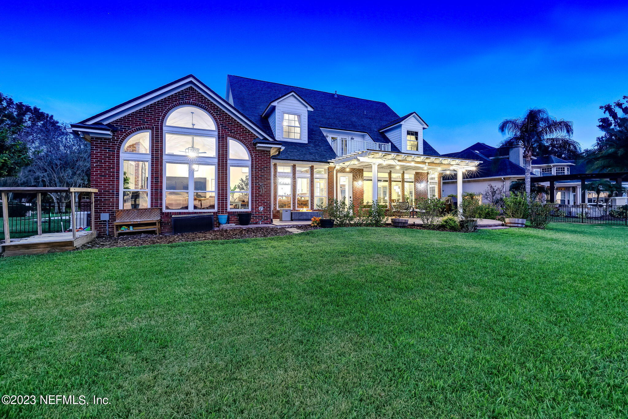 2011 Salt Myrtle Lane Fleming Island, FL 32003 - Photo 89 of 124 a front view of a house with a yard