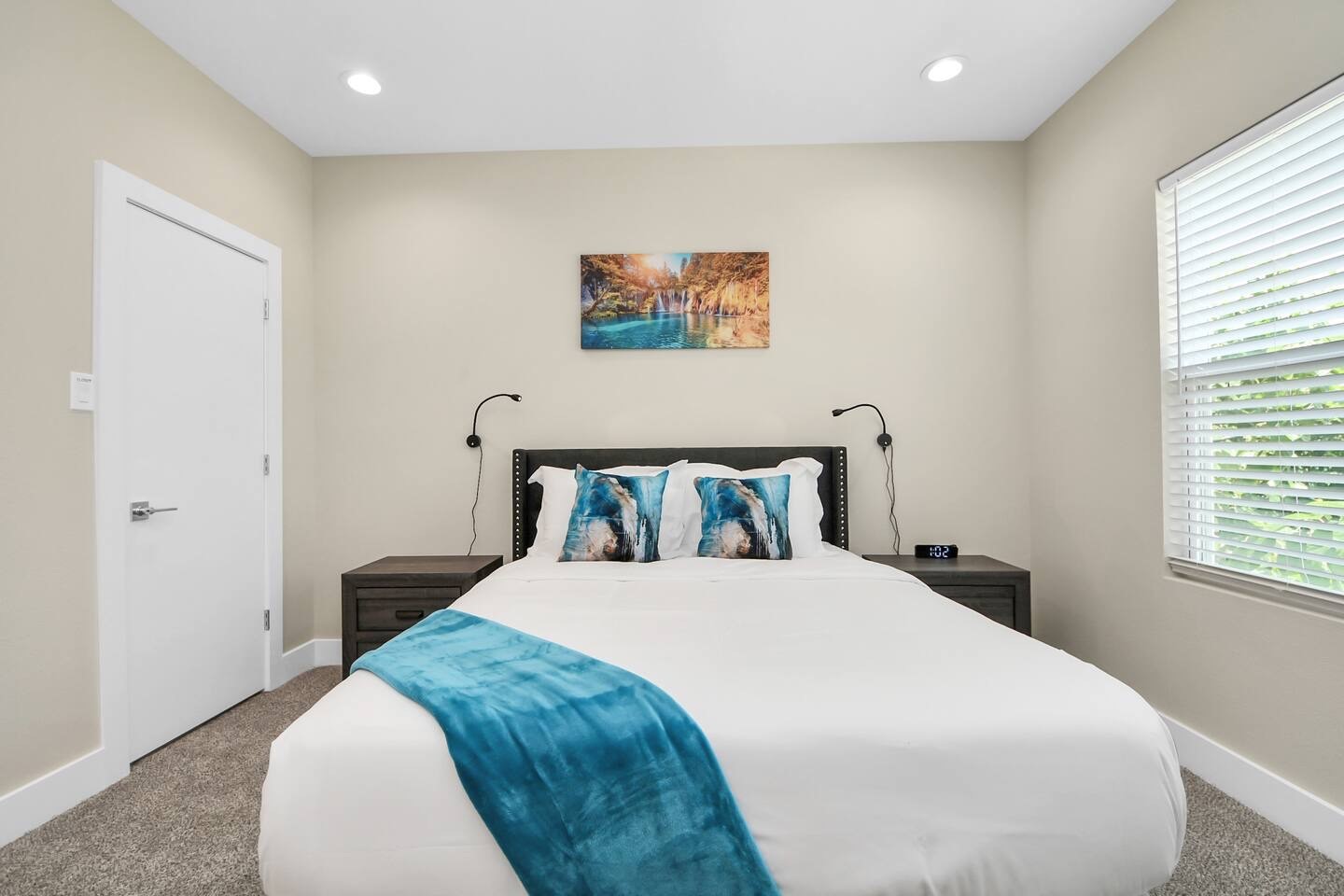 5935 Beall Street, Unit A Houston, TX 77091 - Photo 36 of 50 a bedroom with a bed and a painting