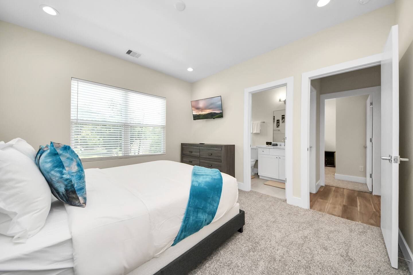 5935 Beall Street, Unit A Houston, TX 77091 - Photo 38 of 50 a large bedroom with a bed and a large window