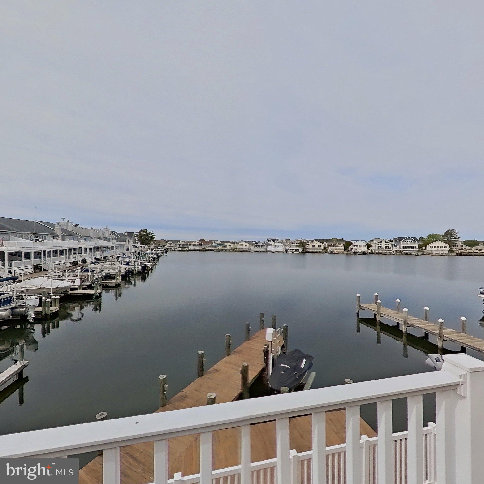 505 South Surf Road Ocean City, MD 21842 - Photo 42 of 49 a terrace with outdoor seating and lake view