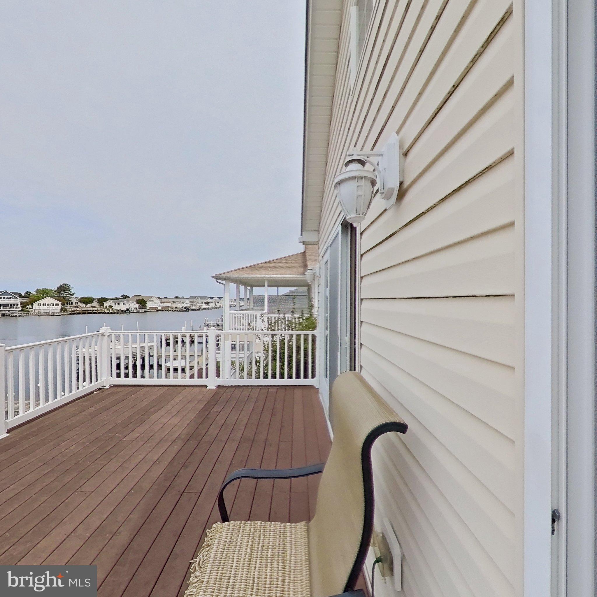 505 South Surf Road Ocean City, MD 21842 - Photo 47 of 49 a view of balcony with wooden floor