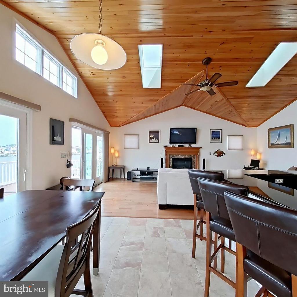 505 South Surf Road Ocean City, MD 21842 - Photo 5 of 49 a view of a dining room with furniture