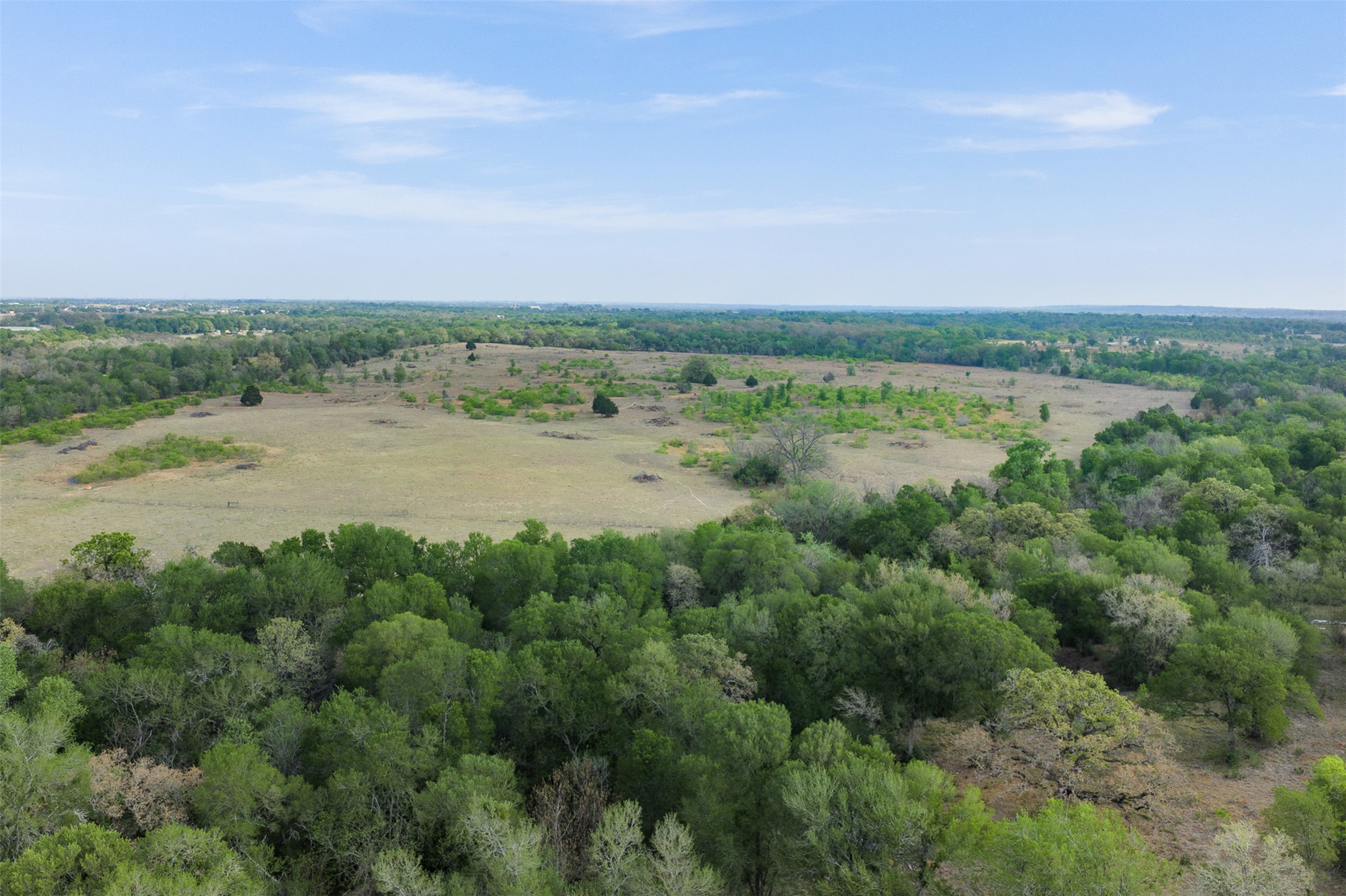 579 Lower Elgin Road Elgin, TX 78621 - Photo 40 of 40 a view of a lake with a city