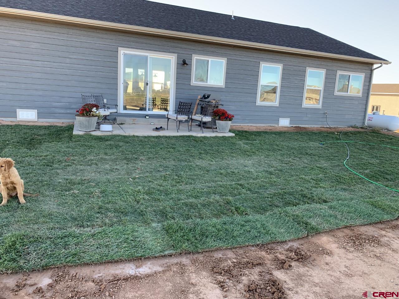 10400 Road 23.5 Cortez, CO 81321 - Photo 25 of 34 a front view of house with yard