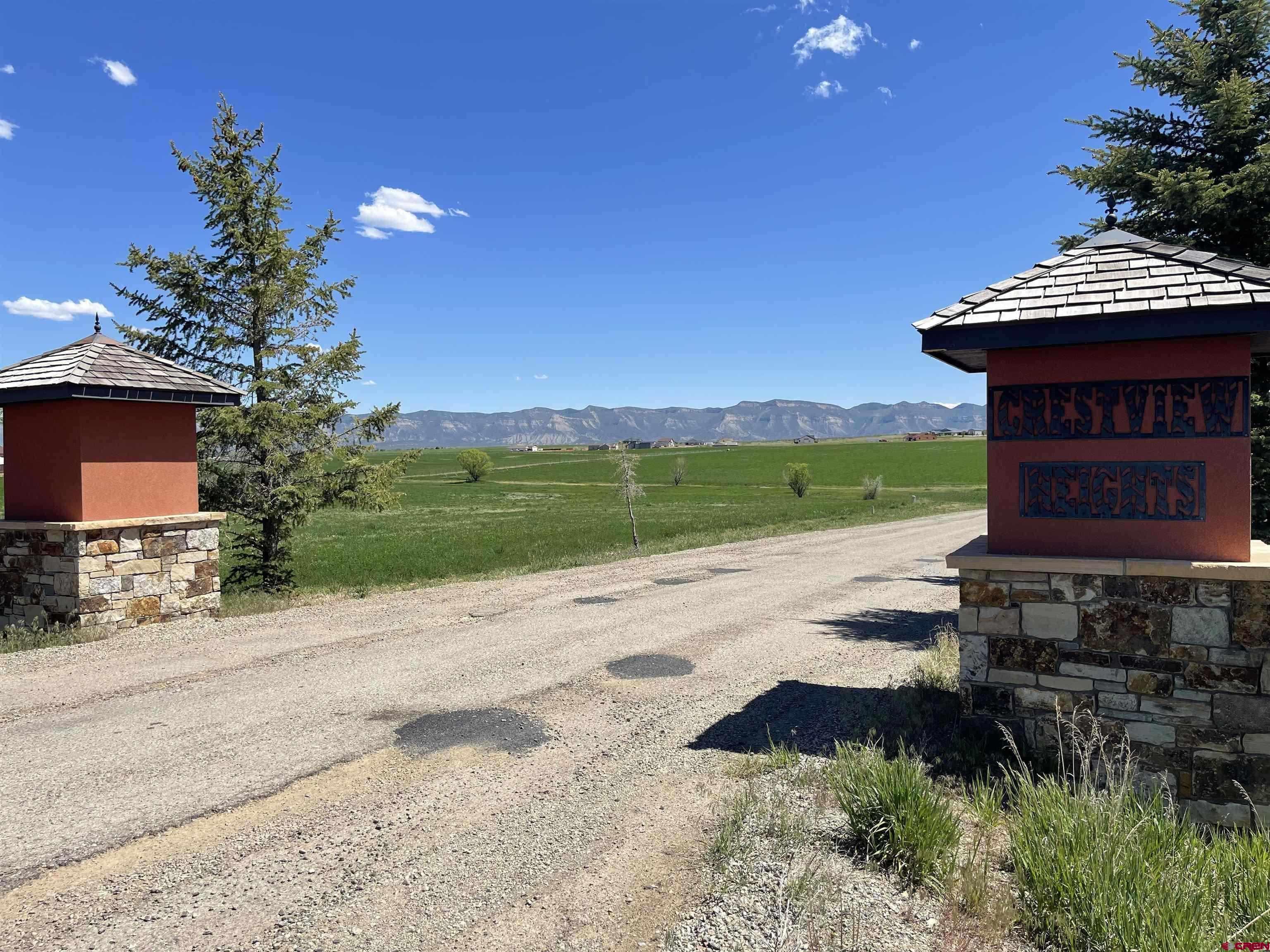 10400 Road 23.5 Cortez, CO 81321 - Photo 3 of 34 a view of a pathway with a yard