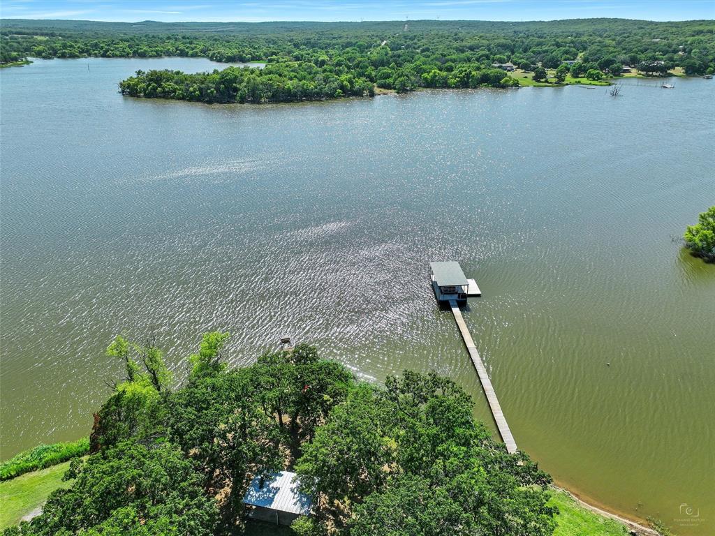 404 Selma Road Bowie, TX 76230 - Photo 6 of 21 a view of a lake view
