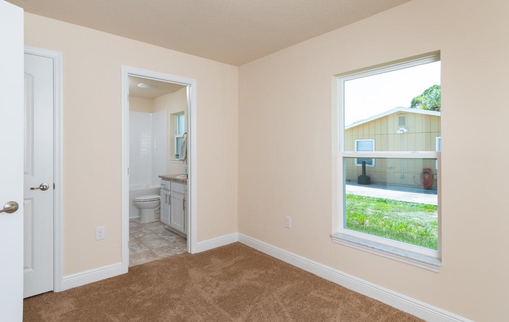 1391 Seahouse Street Sebastian, FL 32958 - Photo 13 of 18 a view of a bathroom from a window