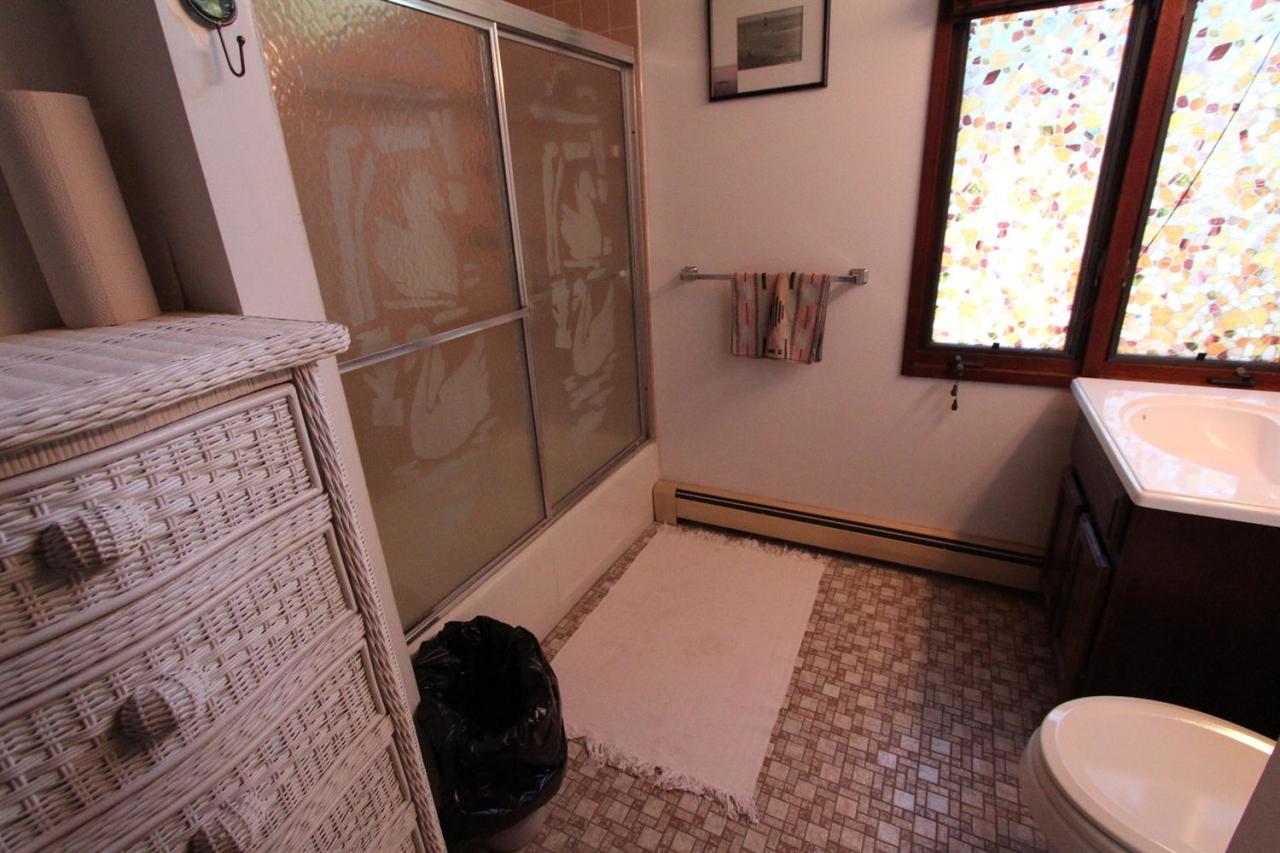 34 Twine Field Road Truro, MA 02666 - Photo 8 of 24 a view of bathroom with a sink and mirror