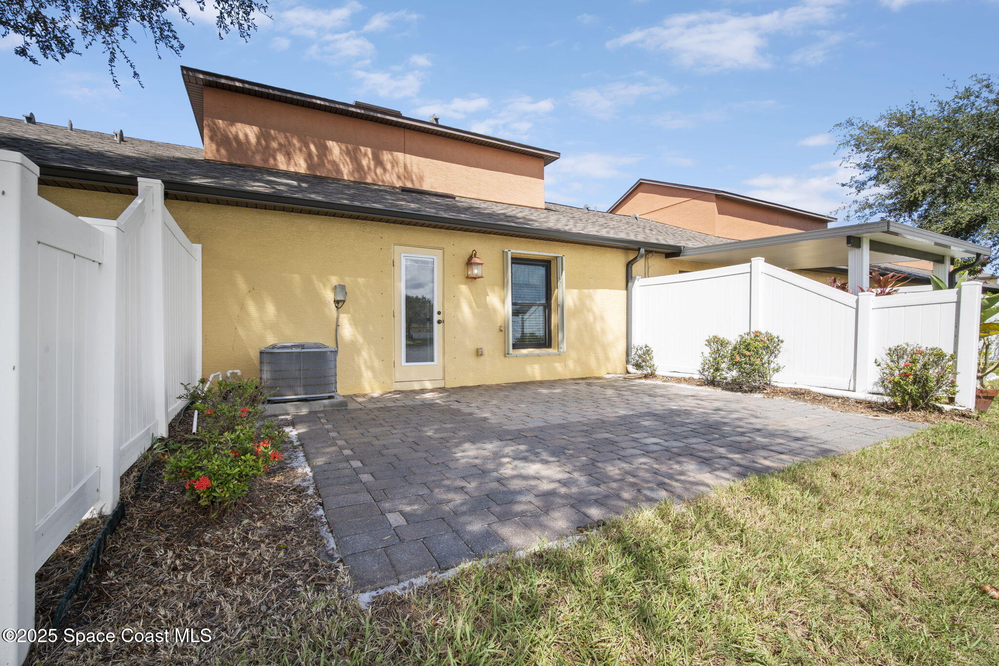 4575 Radiant Way, Unit 102 Melbourne, FL 32901 - Photo 15 of 52 a view of a house with basketball court