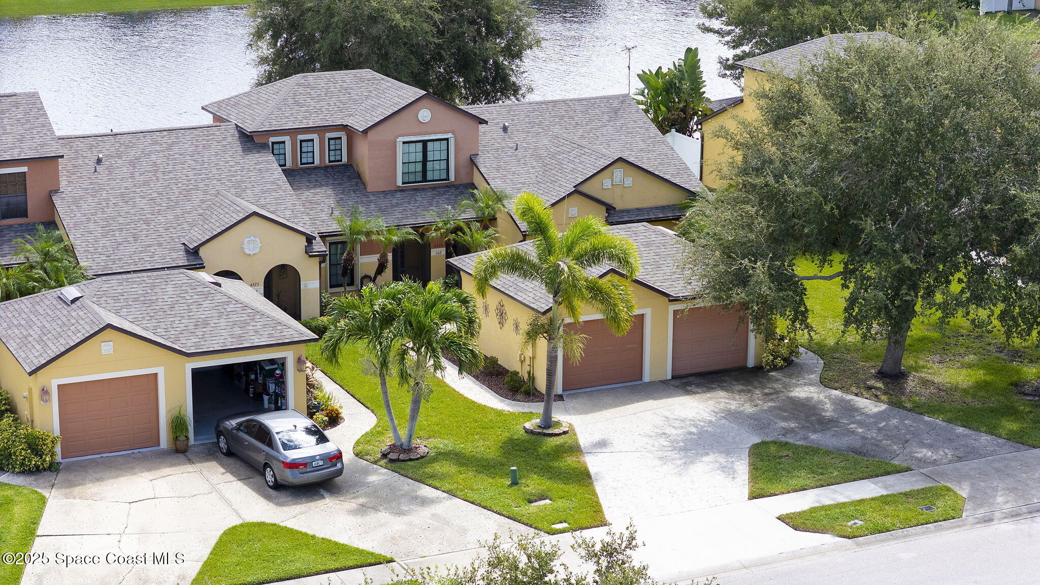 4575 Radiant Way, Unit 102 Melbourne, FL 32901 - Photo 2 of 52 an aerial view of a house