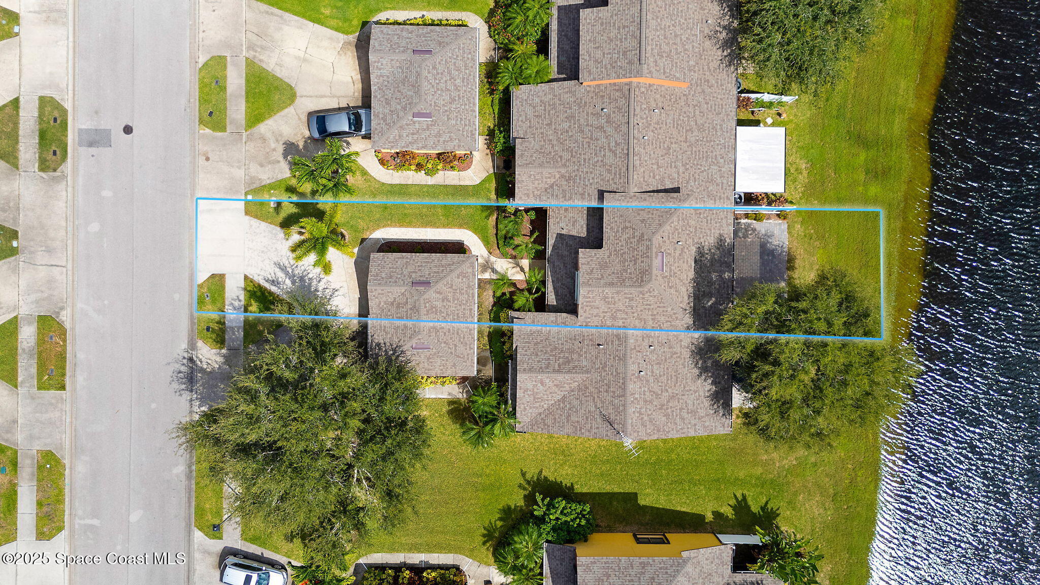 4575 Radiant Way, Unit 102 Melbourne, FL 32901 - Photo 39 of 52 an aerial view of residential house with outdoor space and swimming pool