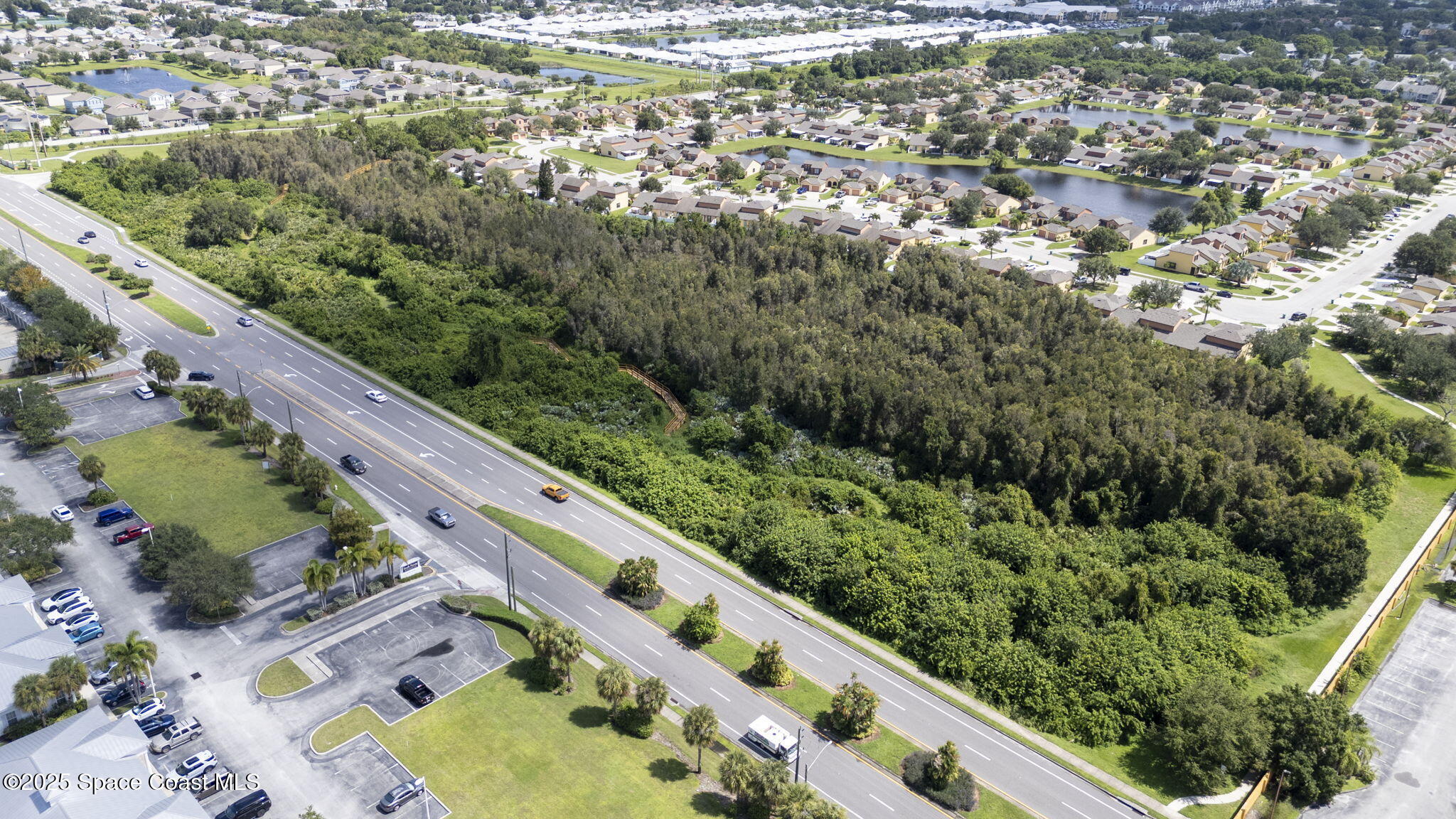 4575 Radiant Way, Unit 102 Melbourne, FL 32901 - Photo 40 of 52 an aerial view of a city