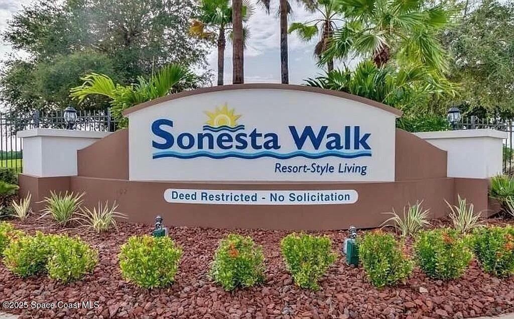 4575 Radiant Way, Unit 102 Melbourne, FL 32901 - Photo 50 of 52 a sign on the side of a building