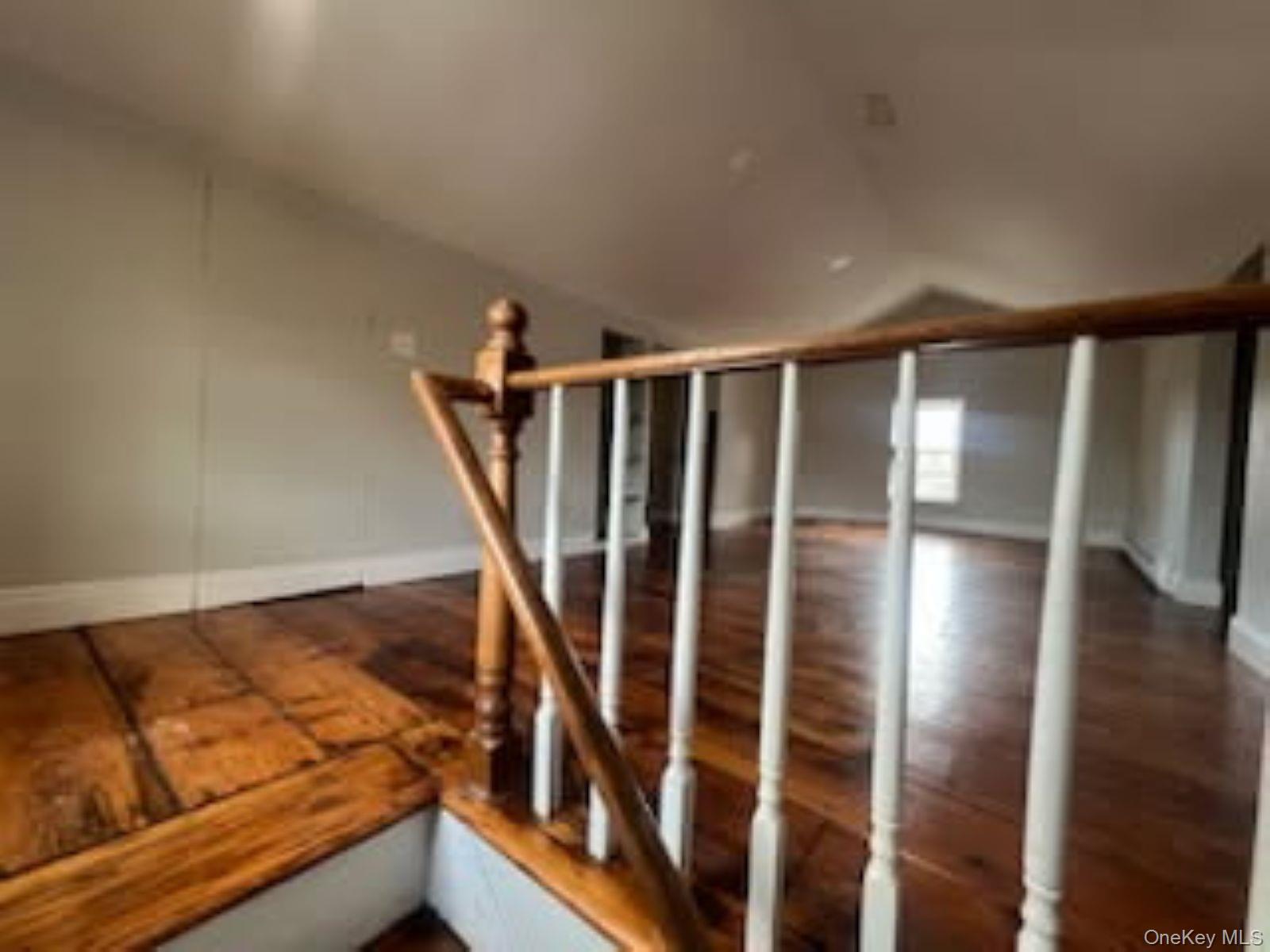 205 Union Street, Unit 2 Poughkeepsie, NY 12601 - Photo 16 of 16 a view of wooden floor and staircase