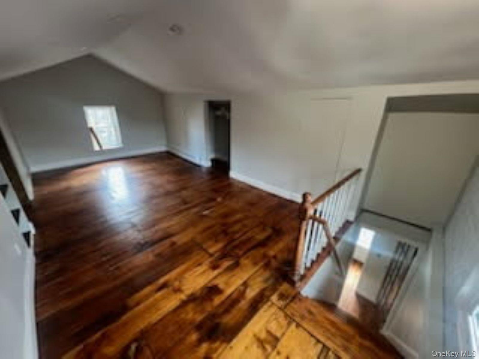 205 Union Street, Unit 2 Poughkeepsie, NY 12601 - Photo 9 of 16 a view of entryway and hall with wooden floor