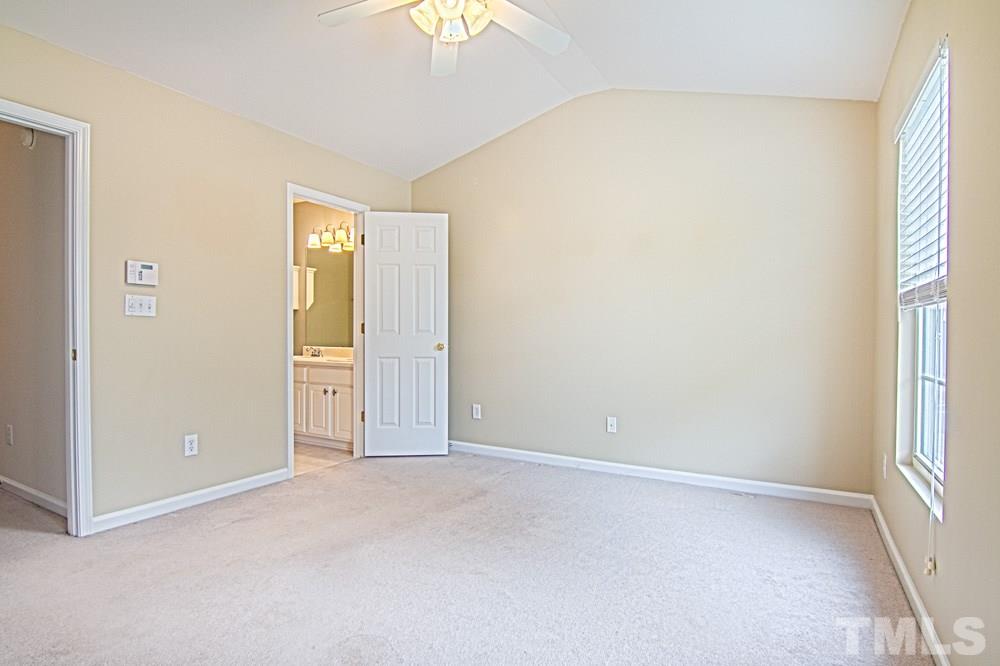 1624 Brook Fern Way Raleigh, NC 27609 - Photo 10 of 15 Vaulted ceilings in both bedrooms upstairs.