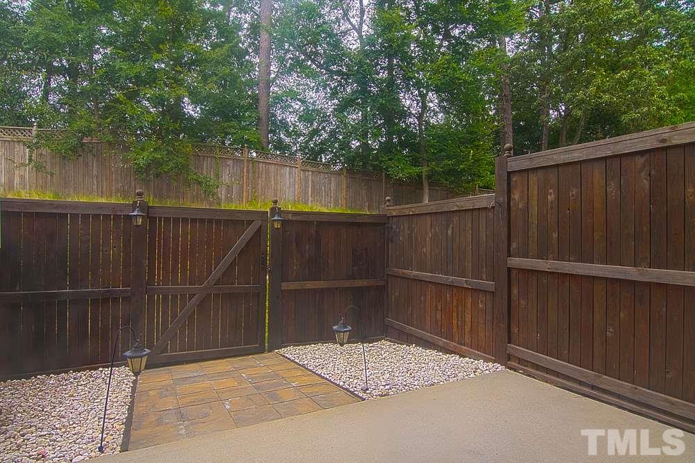 1624 Brook Fern Way Raleigh, NC 27609 - Photo 13 of 15 Maintenance free backyard perfect for gatherings.