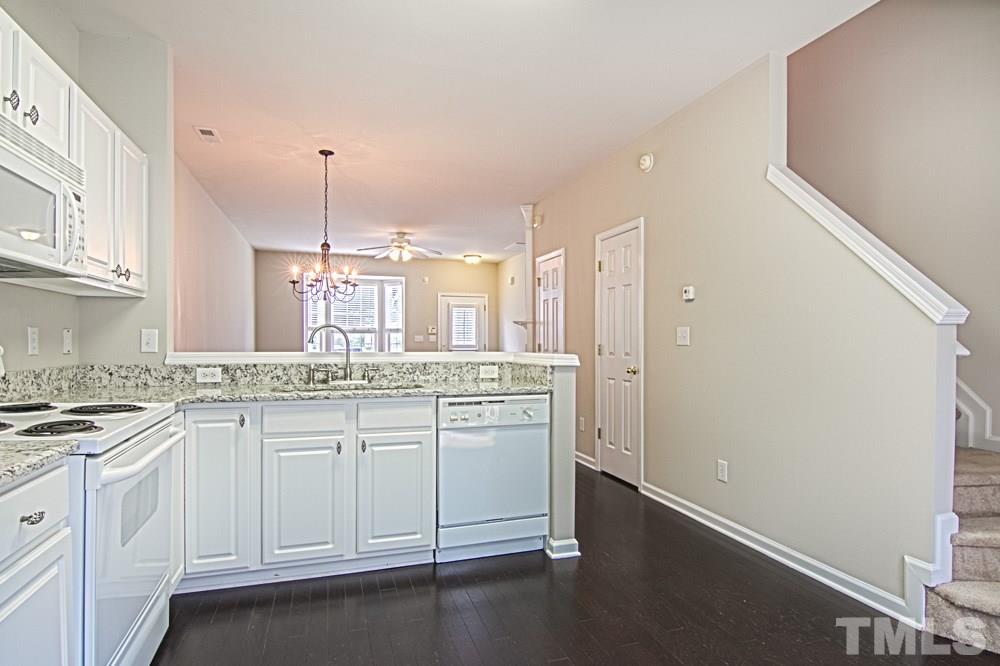 1624 Brook Fern Way Raleigh, NC 27609 - Photo 15 of 15 Open floorplan kitchen looks out into living area.