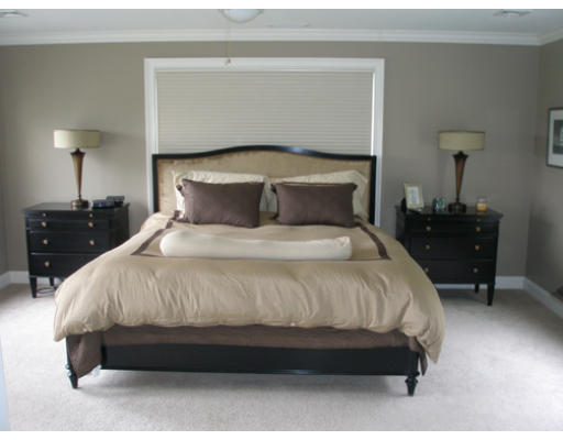 310 Old Wilson Road Northampton, MA 01062 - Photo 11 of 23 a large bed sitting in a bedroom next to a lamp