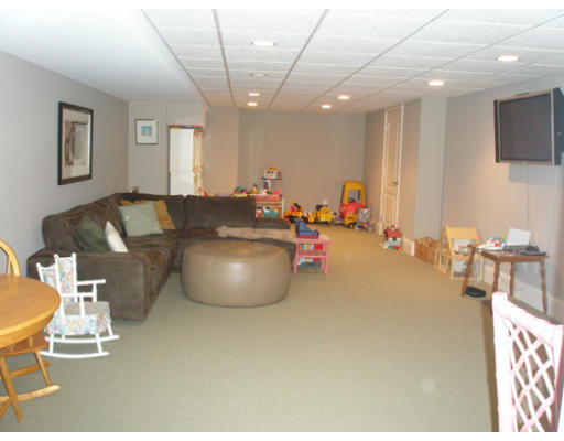 310 Old Wilson Road Northampton, MA 01062 - Photo 18 of 23 a living room with furniture and a flat screen tv
