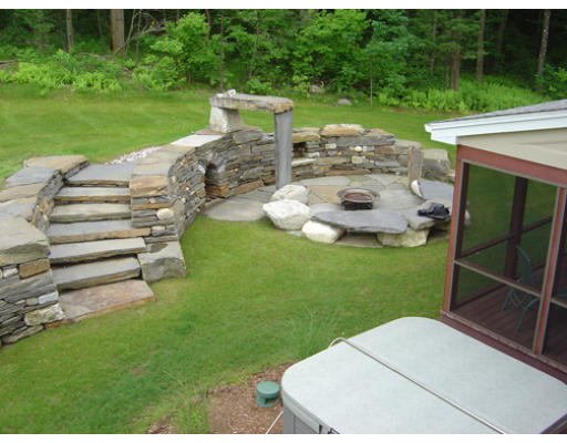 310 Old Wilson Road Northampton, MA 01062 - Photo 2 of 23 a backyard of a house with table and chairs