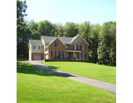 310 Old Wilson Road Northampton, MA 01062 - Photo 23 of 23 a front view of a house with a yard