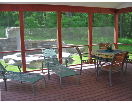 310 Old Wilson Road Northampton, MA 01062 - Photo 3 of 23 a dining room with wooden floor glass table and chairs