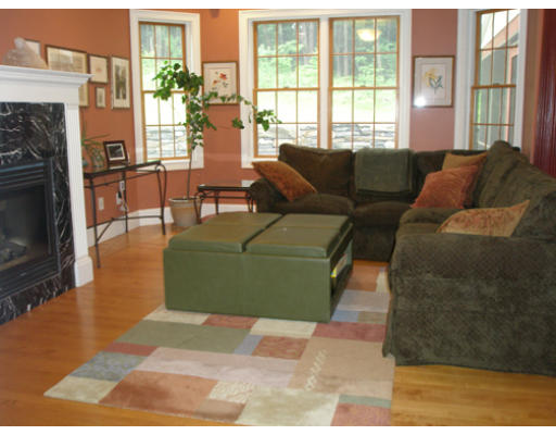 310 Old Wilson Road Northampton, MA 01062 - Photo 5 of 23 a living room with furniture and a fireplace